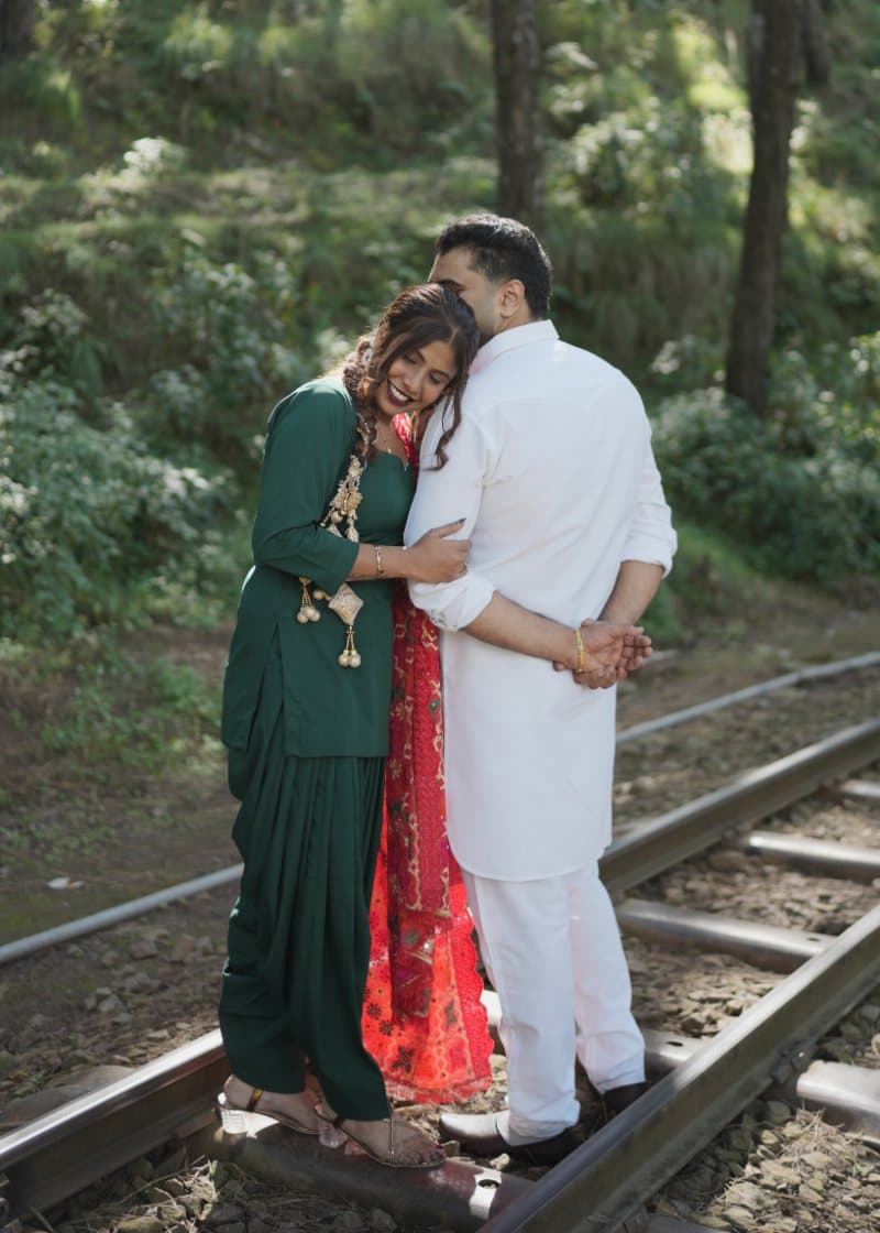 Samriti and Sarthak in an embrace on the railway track